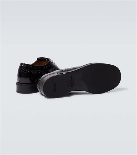 herrenschuhe schnürschuhe schwarz miu miu größe 44|X Church's Schnürschuhe aus Leder in Schwarz .